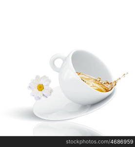 Chamomile tea. White cup of tea with chamomile flower