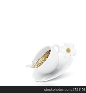 Chamomile tea. White cup of tea with chamomile flower