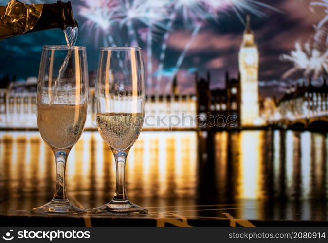 champagne glasses and Big Ben in background New Year&rsquo;s eve in London
