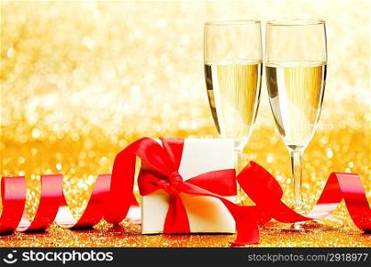 Champagne glasses and gift