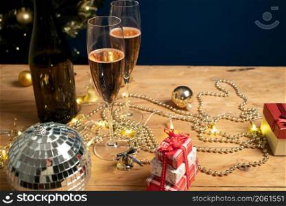 champagne glasses on wooden table