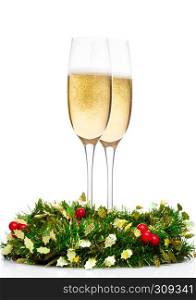 Champagne glasses with christmas decoration on white background