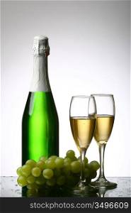 champagne grape and green bottle