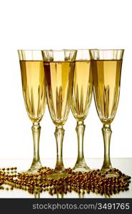 champagne in glasses on white background