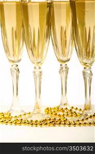 champagne in glasses on white background