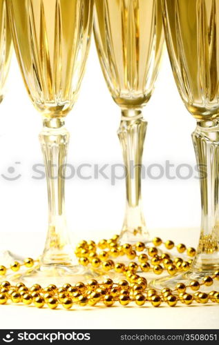 champagne in glasses on white background