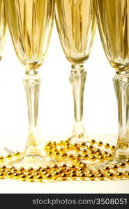 champagne in glasses on white background