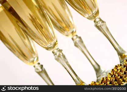 champagne in glasses on white background