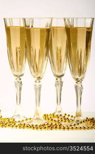 champagne in glasses on white background