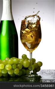 champagne splash grape and green bottle