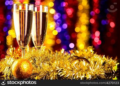 champagne with christmas toys on blurred background