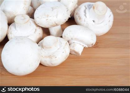 champignons on wooden board