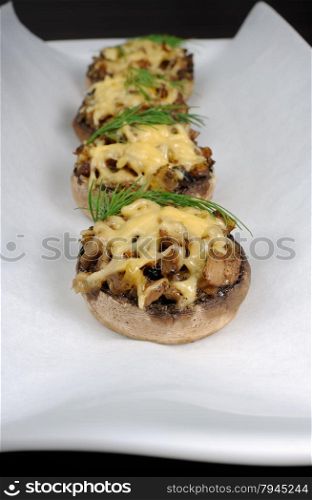 champignons with vegetable stuffing and cheese