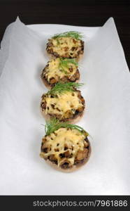 champignons with vegetable stuffing and cheese