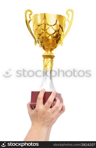 champion golden cup in hands