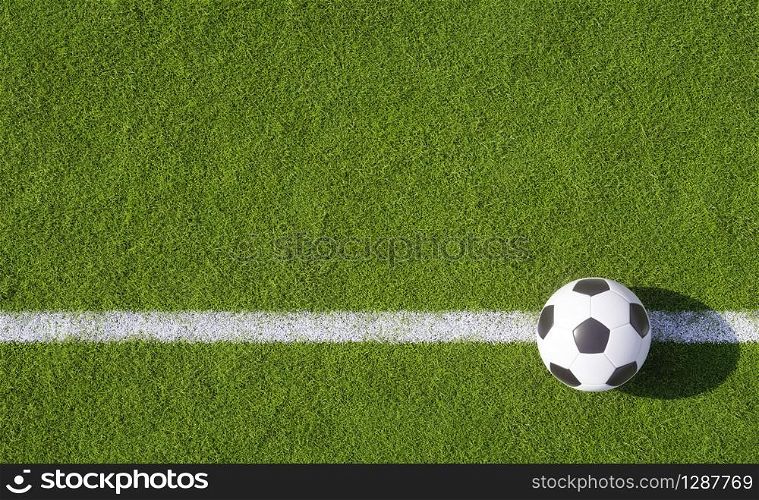 Championship football or soccer ball on a green sports field placed on a white line on the turf in evening light with copy space