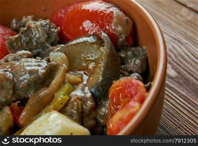 Chanakhi - traditional Georgian dish of lamb stew with tomatoes, aubergines, potatoes, greens and garlic.