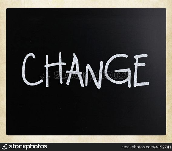 ""Change" handwritten with white chalk on a blackboard"