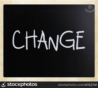 ""Change" handwritten with white chalk on a blackboard"