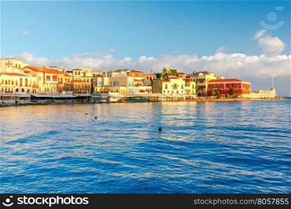 Chania. The old harbor.. Multi-colored facades of old medieval houses in the old harbor of Chania. Greece. Crete.