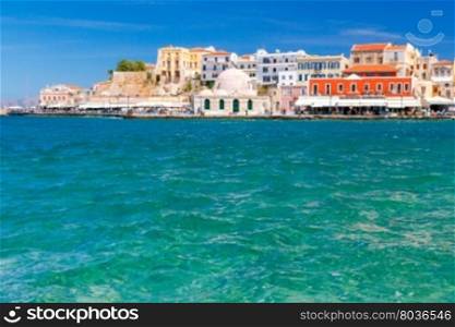 Chania. The old Venetian harbor.. View of the embankment and the mosque Kucuk Hasan Pasha in the Venetian harbor. Crete. Greece.