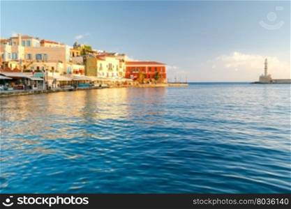 Chania. The old Venetian harbor.. View of the quay with lanterns and old lighthouse in the Venetian harbor. Crete. Greece.