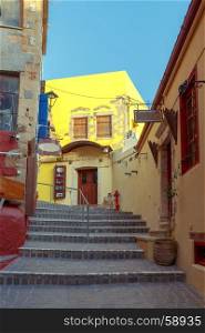 Chania. Traditional narrow street.. An old narrow street and a staircase in the city Chania. Crete. Greece.