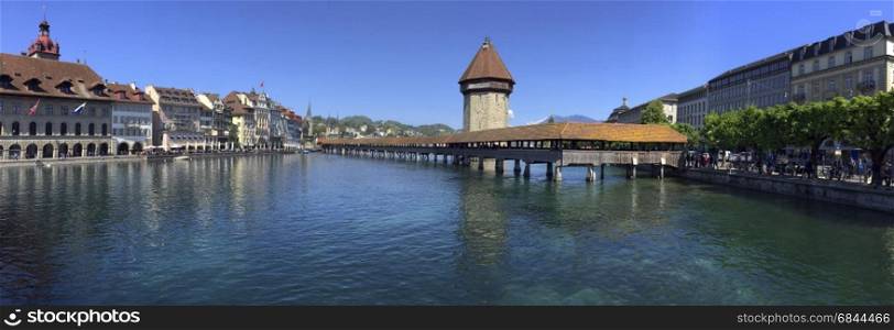 Chapel Bridge - a 14th century covered wooden footbridge that spans the Reuss in the city of Luzern (Lucerne) in Switzerland.