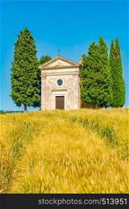 Chapel of the Madonna di Vitaleta on the hill in the hilly Tuscany Field at Valdorcia in Provinc of Siena Italy