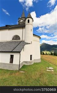 characteristic alpine church in Laste, Veneto Italy