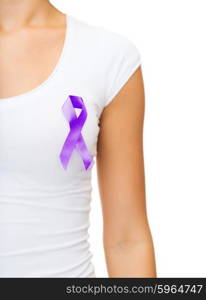 charity, people, health care and social issue concept - close up of woman with purple domestic violence awareness ribbon on her chest