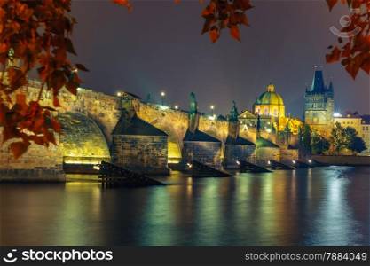 Charles Bridge and Old Town bridge tower at night in Prague, Czech Republic
