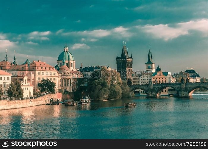 Charles Bridge and Old Town in Prague, Czech Republic, at evening. Toning in cool tones