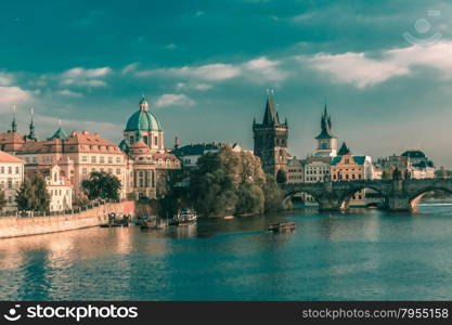Charles Bridge and Old Town in Prague, Czech Republic, at evening. Toning in cool tones