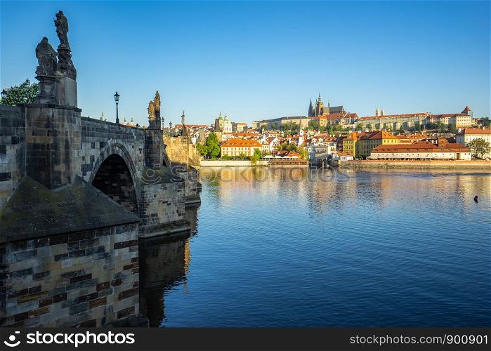Charles Bridge with Prague city skyline in Prague, Czech Republic.