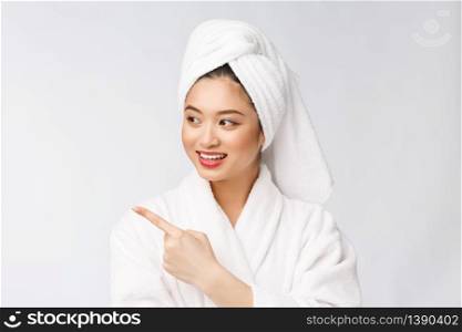 Charming beautiful young woman pointing finger. Attractive beautiful girl get surprise, happiness and love a product, brand, service. Charming beautiful young woman pointing finger. Attractive beautiful girl get surprise, happiness and love a product, brand, service.