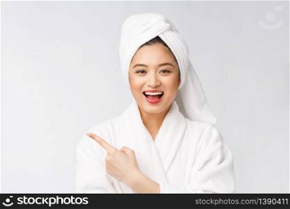 Charming beautiful young woman pointing finger. Attractive beautiful girl get surprise, happiness and love a product, brand, service. Charming beautiful young woman pointing finger. Attractive beautiful girl get surprise, happiness and love a product, brand, service.