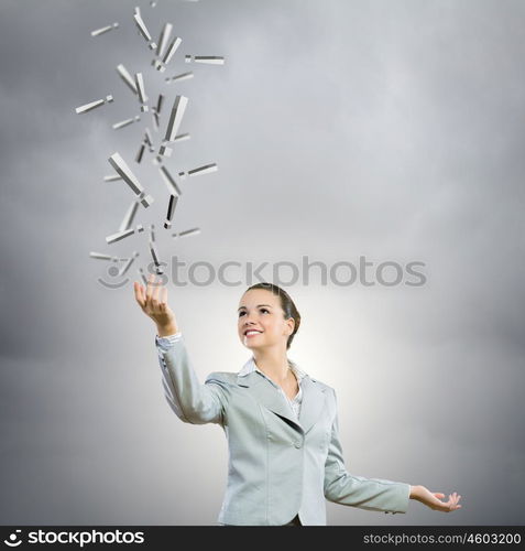 Charming businesswoman. Image of businesswoman holding exclamation marks in hand