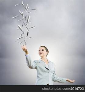 Charming businesswoman. Image of businesswoman holding exclamation marks in hand