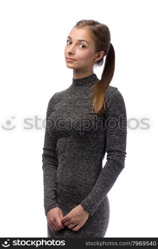 Charming girl in gray dress in the studio isolate on white.