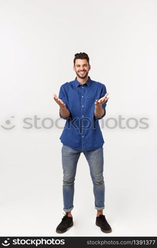 Charming handsome. Handsome young man in casual wear while standing isolated on white background.. Charming handsome. Handsome young man in casual wear while standing isolated on white background