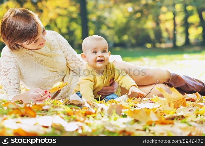 Charming mother looking after child