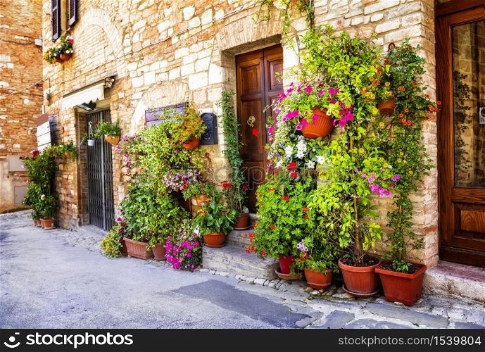 Charming old medieval villages of Italy with typical floral narrow streets. Spello , Umbria. typical floral streets of Italian villages, Spello