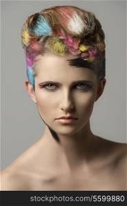 charming sexy woman in close-up portrait with colorful hair-style and bizarre make-up. artistic painted style