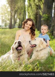 Charming woman with kid and two dogs
