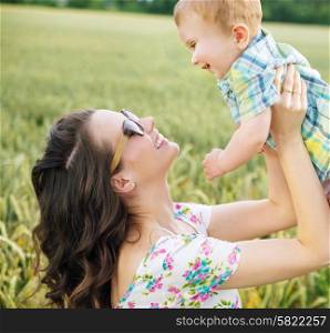 Charming young mother with little child