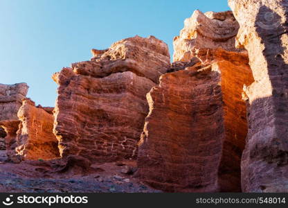 Charyn Canyon bottom view - geological formation consists of amazing big red sand stone. Charyn National Park. Kazakhstan. Charyn Canyon bottom view - geological formation consists of amazing big red sand stone. Charyn National Park. Kazakhstan.
