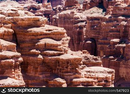 Charyn Canyon top view - geological formation consists of amazing big red sand stone. Charyn National Park. Kazakhstan. Charyn Canyon top view - geological formation consists of amazing big red sand stone. Charyn National Park. Kazakhstan.