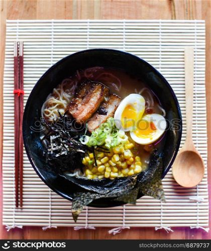 Chashu Pork Miso Ramen, Flavor packed with a blended miso paste. Topped with buttered corn and braised pork belly.