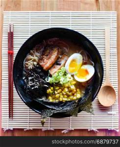 Chashu Pork Miso Ramen, Flavor packed with a blended miso paste. Topped with buttered corn and braised pork belly.